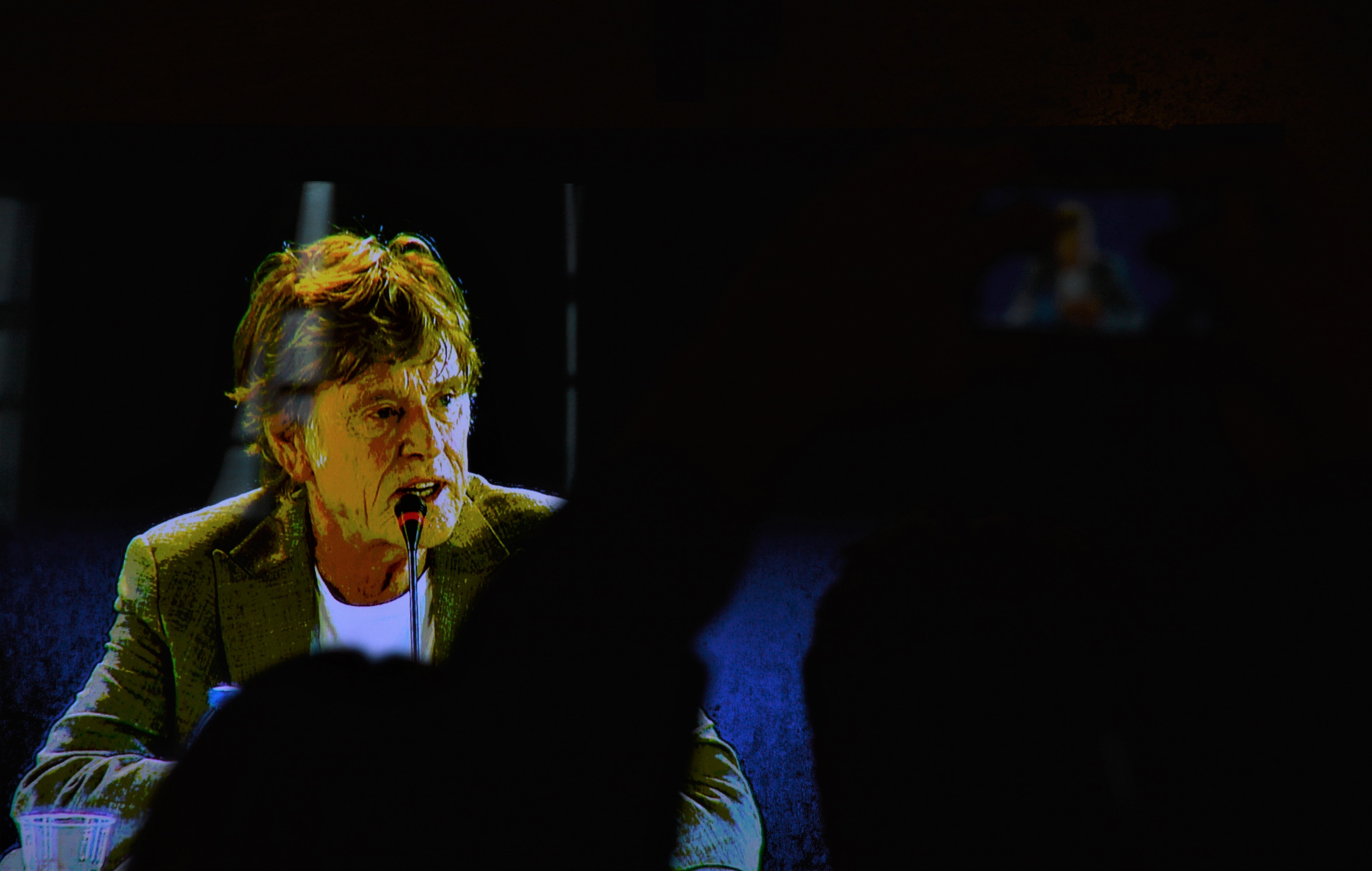 11 - Robert Redford sullo schermo che trasmette la conferenza stampa di 'Our souls at night', film fuori concorso. All'attore americano è stato conferito il Leone d'oro alla carriera