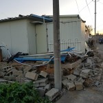 Una casa distrutta dopo il terremoto