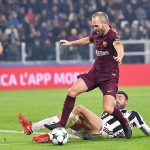 Barzagli contrasta Iniesta