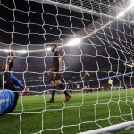 Alisson battuto dal tiro dall'acrobazia di Griezmann