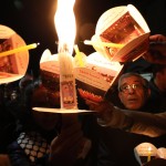 Ad Amman gruppi di fedeli sfilano in una marcia pacifista di candele