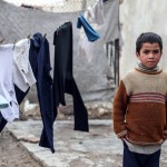 Un bambino siriano sfollato Un bambino siriano sfollato