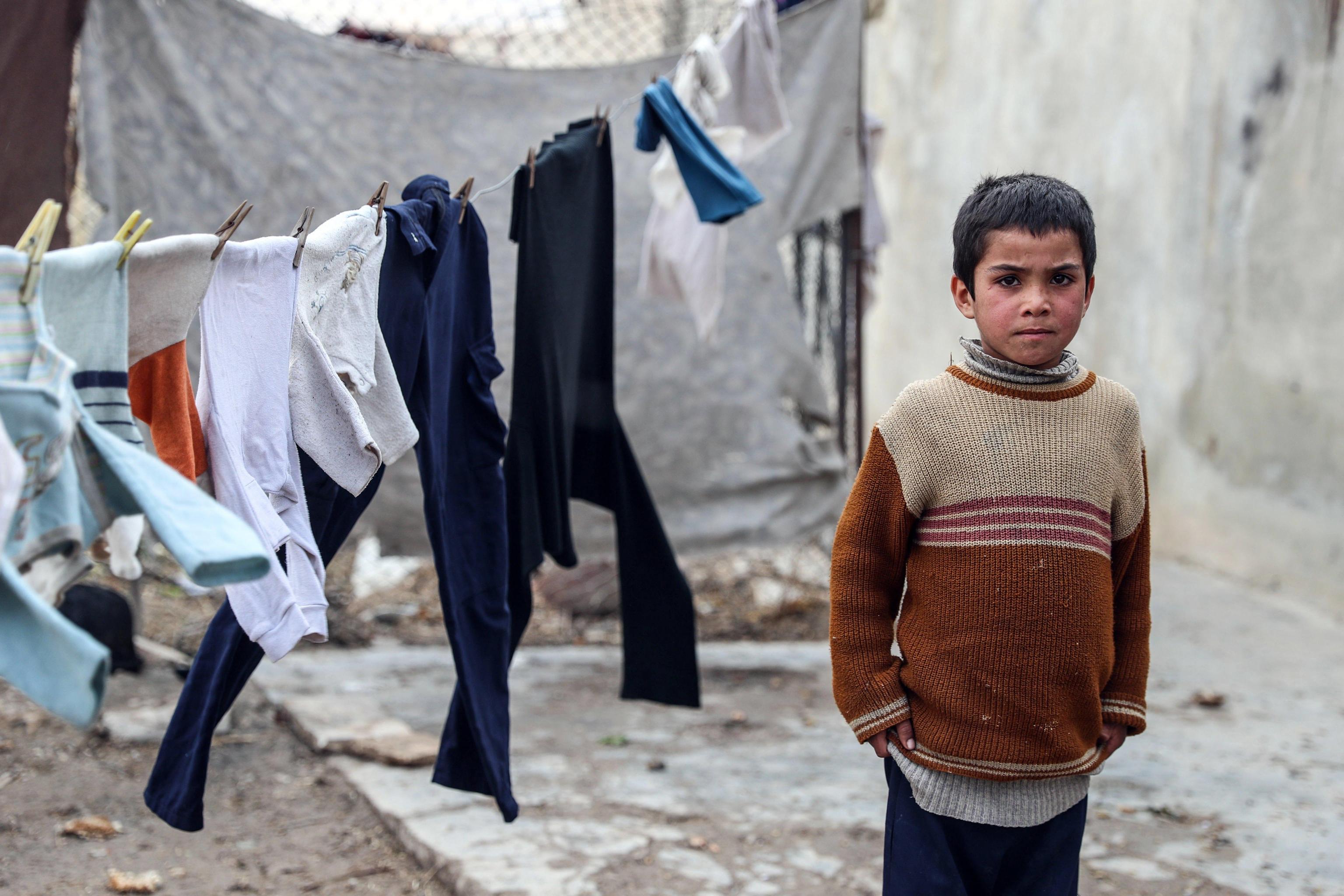 Un bambino siriano sfollato Un bambino siriano sfollato