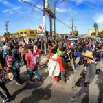 Dozzine di immigrati per le strade di Tijuana
