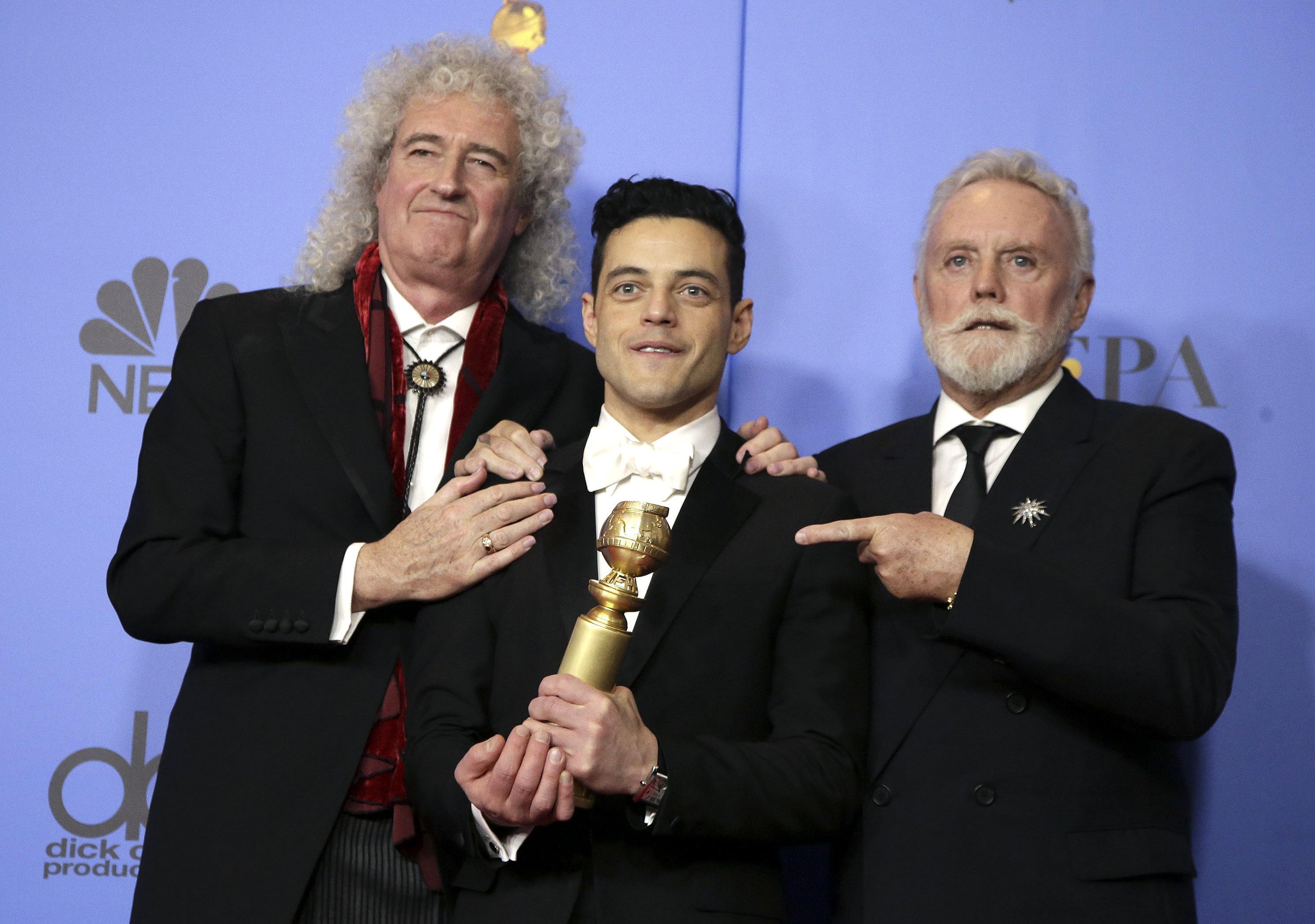 Rami Malek, ritratto con Brian May e Roger Taylor, è stato premiato come miglior protagonista drammatico