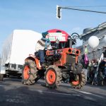 Un trattore per le strade di Berlino durante la manifestazione