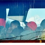 I migranti sull'autobus per la ricollocazione I migranti sull'autobus per la ricollocazione