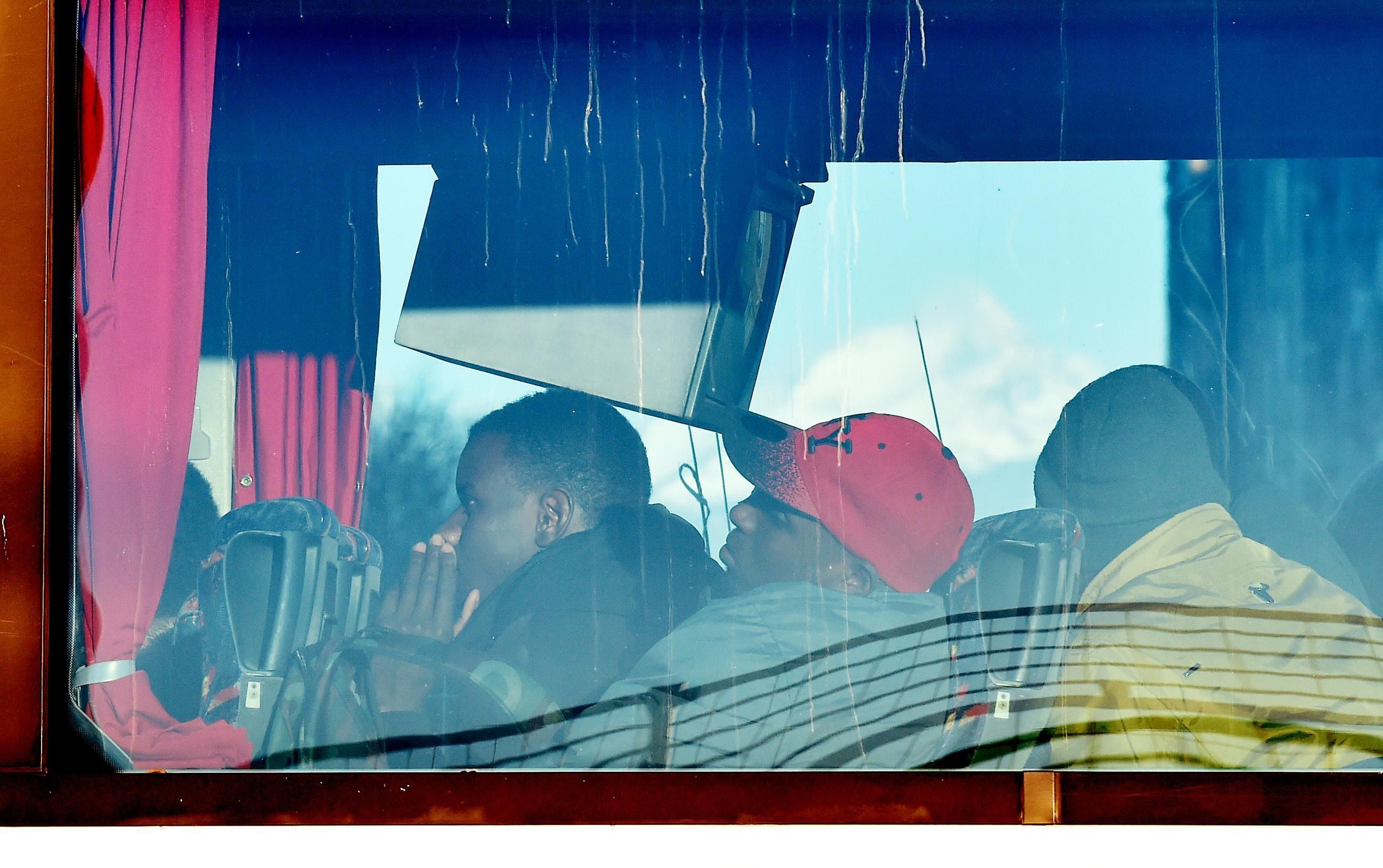 I migranti sull'autobus per la ricollocazione I migranti sull'autobus per la ricollocazione