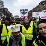 I manifestanti marciano verso gli Champs-Elysees il 26 gennaio 2019 I manifestanti marciano verso gli Champs-Elysees il 26 gennaio 2019