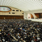 L'Aula Paolo VI gremita da docenti, personale e studenti