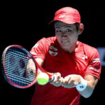 Il tennista giapponese Yoshihito Nishioka in azione contro Rafael Nadal (Spagna)