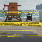 I nastri gialli sbarrano l'accesso alle spiagge di South Beach I nastri gialli sbarrano l'accesso alle spiagge di South Beach