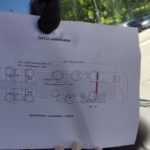 Il conducente ha una mappa dell'autobus in cui è segnalata la disposizione dei posti, 11 in tutto Il conducente ha una mappa dell'autobus in cui è segnalata la disposizione dei posti, 11 in tutto