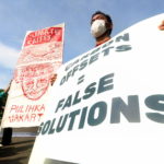 I manifestanti protestano a Giacarta contro il cambiamento climatico