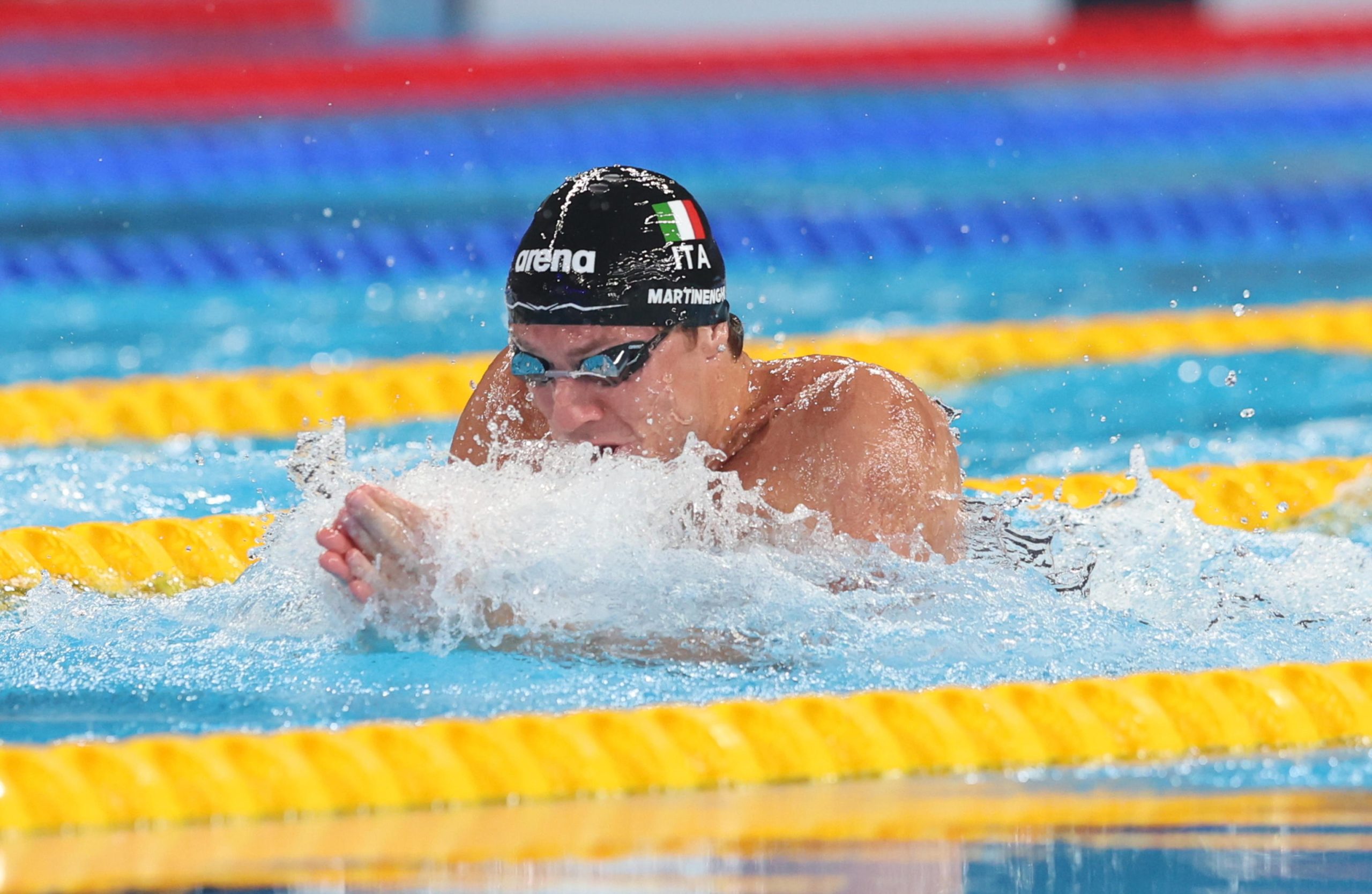 Nicolò Martinenghi durante la gara delle categoria dei 100 rana alle finali di Doha. Il nuotatore poi vincerà la medaglia d'argento. Nicolò Martinenghi durante la gara delle categoria dei 100 rana alle finali di Doha. Il nuotatore poi vincerà la medaglia d'argento.