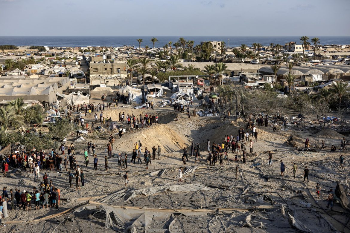 Palestinians search for missing people following Israeli airstrikes on Al-Mawasi humanitarian zone
